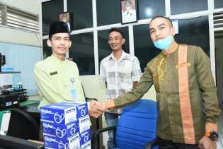 Lewat RAPI, Diskominfotik Bagikan Masker Kepada Masyarakat