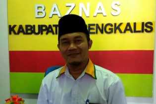 Baznas Kabupaten Bengkalis Salurkan Sumbangan Rp112.734.000 dan 816 Kg Pakaian