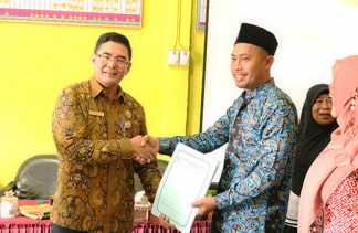 Dipersip Sosialisasi dan MoU dengan Perpusdes Terbaik Se-Riau