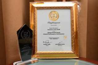 Bupati Bengkalis Terima Penghargaan dari SPS Riau