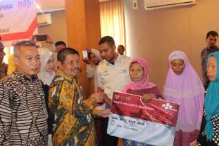  Bupati Bengkalis Melaunching Penyaluran Bantuan Sosial Non Tunai PKH
