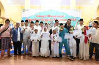 Masyarakat Bukit Batu Antusias Ikut Pawai Obor